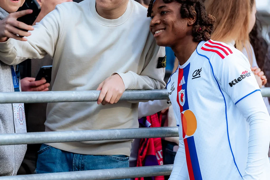 Melchie Dumornay & les supporters